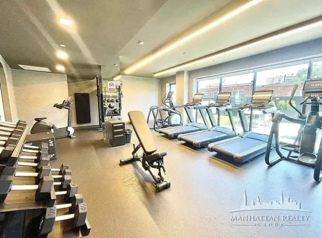 a view of a room with gym equipment