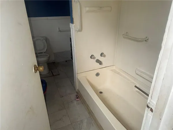 a bathroom with a bathtub