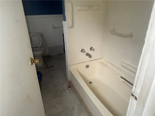 a bathroom with a bathtub