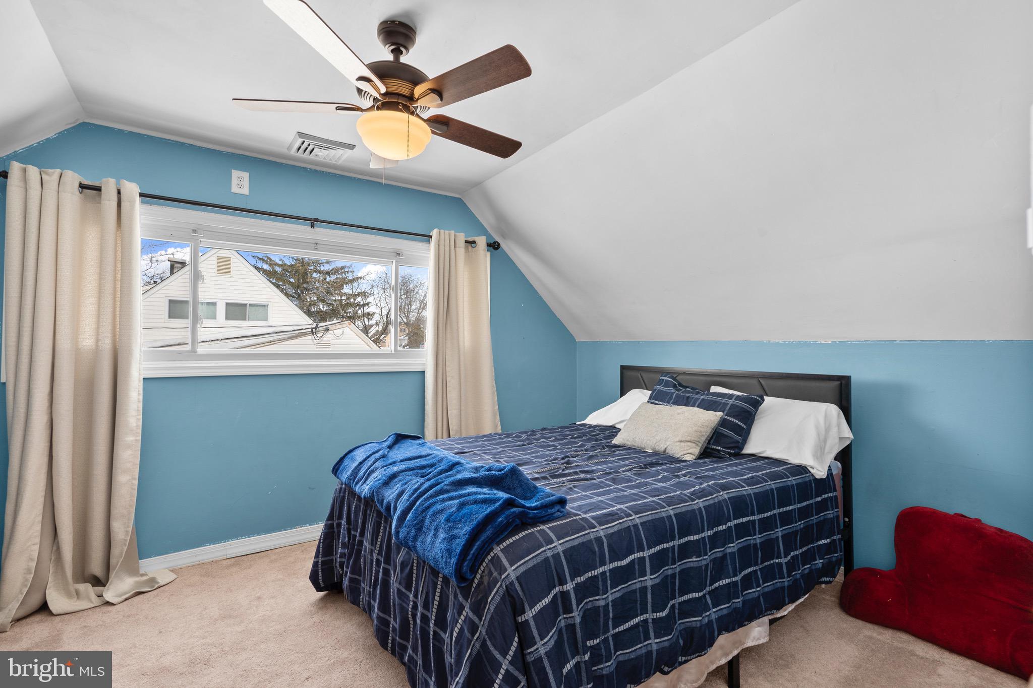 9 Honey Locust Road Levittown, PA 19056 - Photo 21 of 34 a bedroom with a bed and window