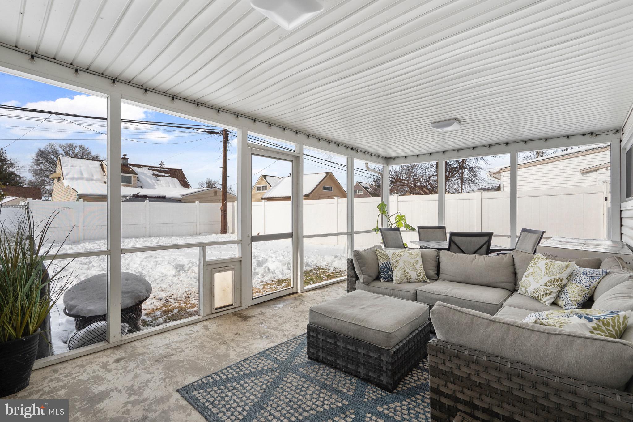 9 Honey Locust Road Levittown, PA 19056 - Photo 25 of 34 a living room with furniture and a large window