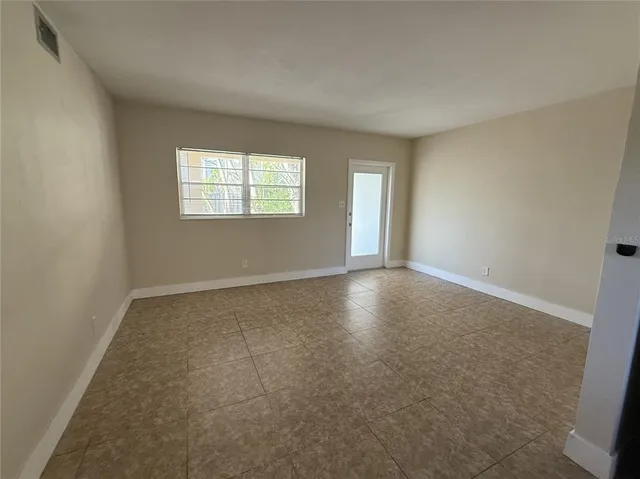 an empty room with windows