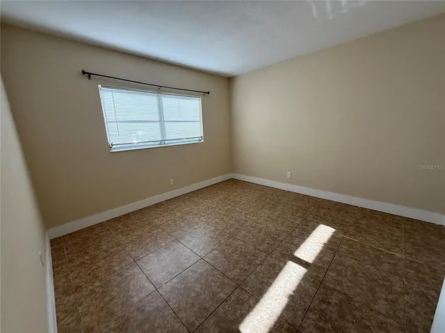 an empty room with a door