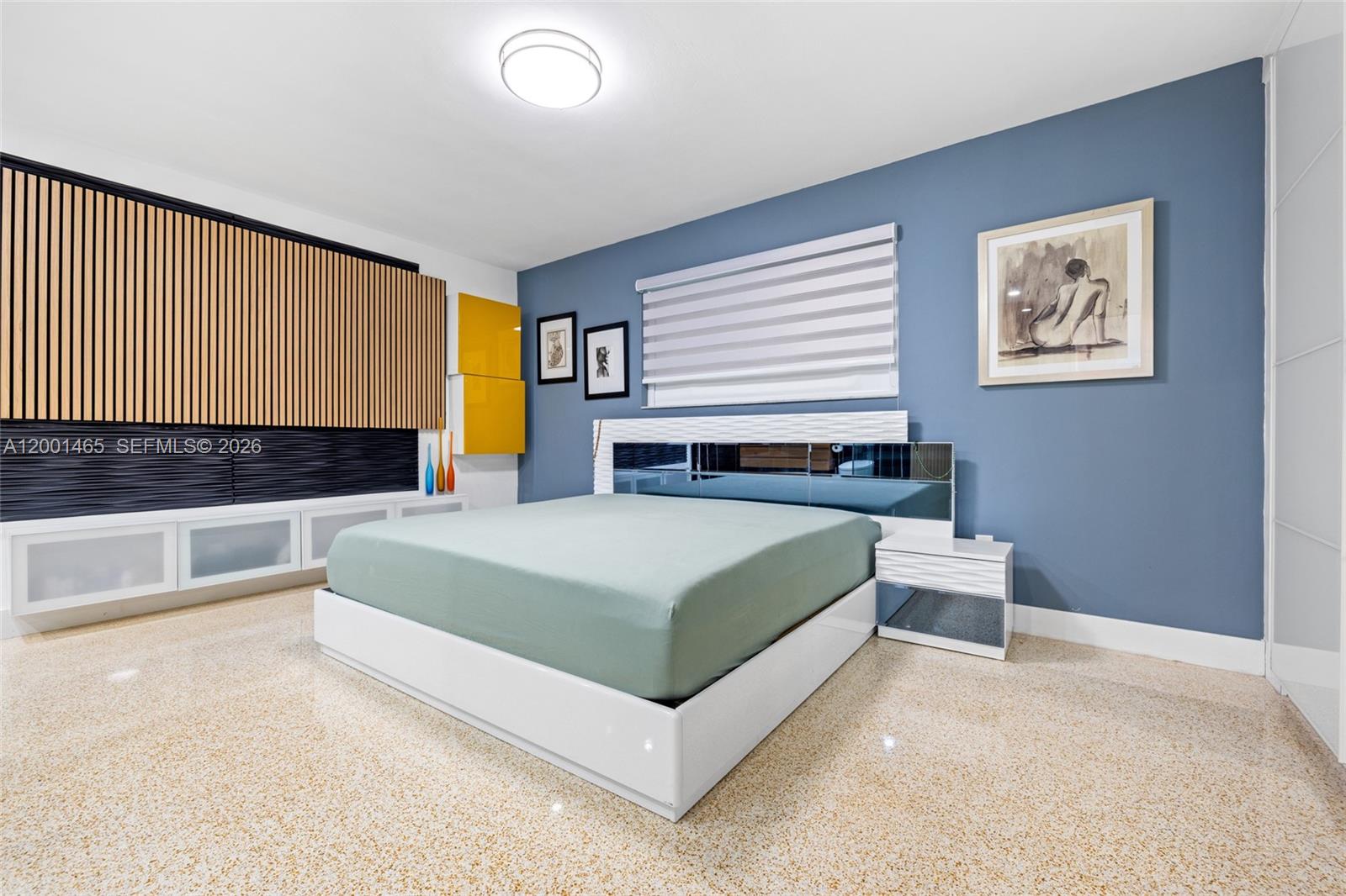 2121 Red Road Miami, FL 33155 - Photo 16 of 37 a bedroom with a bed lamp and a large window