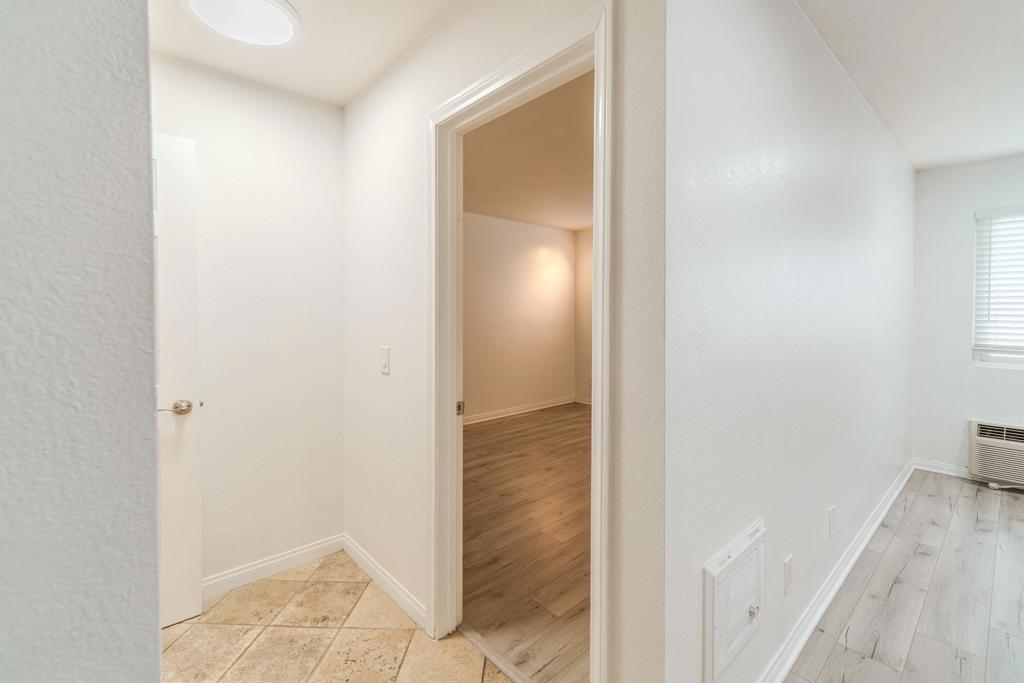 9860 Dale Avenue, Unit D10 Spring Valley, CA 91977 - Photo 15 of 55 a view of a bathroom from a hallway