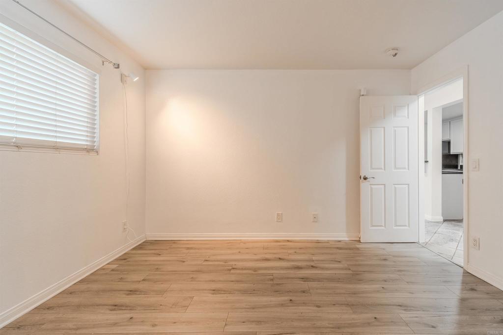 9860 Dale Avenue, Unit D10 Spring Valley, CA 91977 - Photo 19 of 55 wooden floor in an empty room