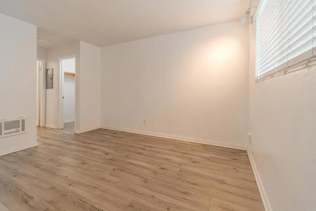 a view of an empty room and window