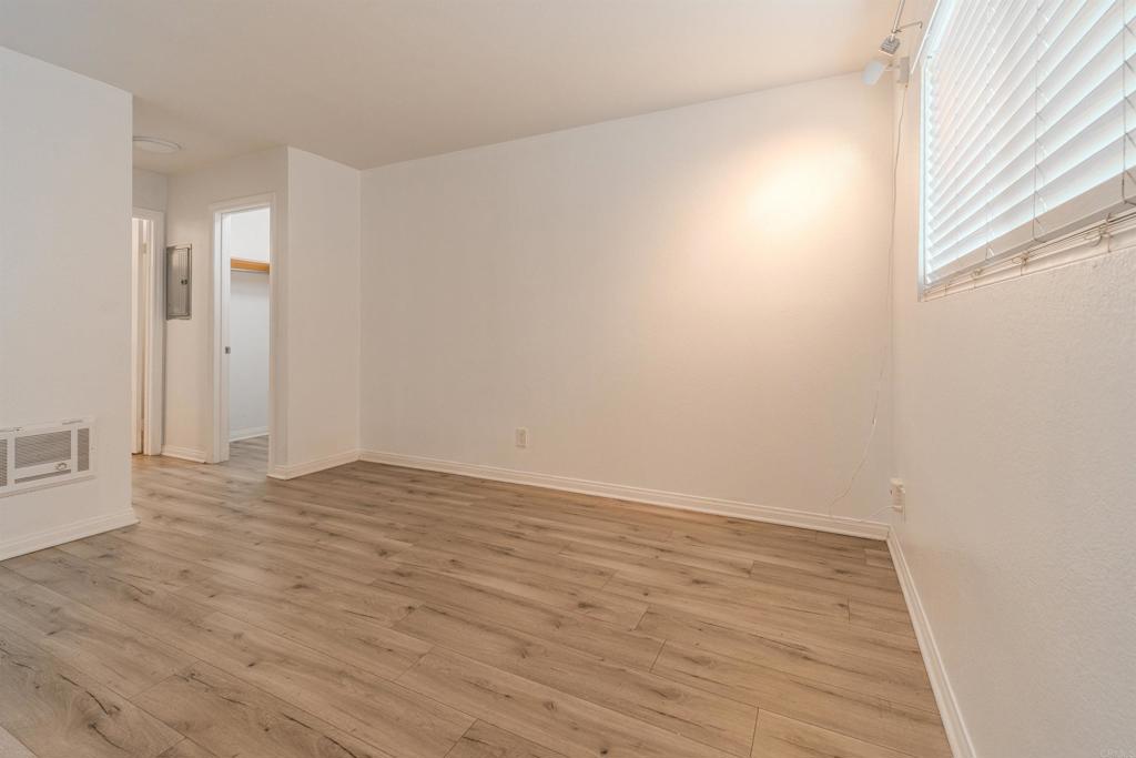 9860 Dale Avenue, Unit D10 Spring Valley, CA 91977 - Photo 24 of 55 a view of an empty room and wooden floor