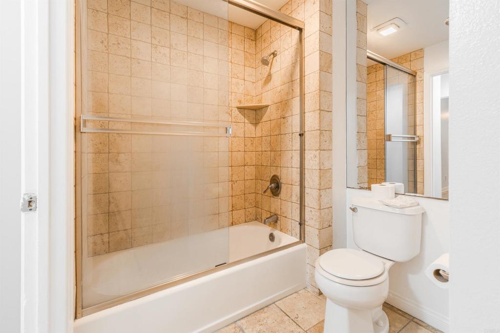 9860 Dale Avenue, Unit D10 Spring Valley, CA 91977 - Photo 30 of 55 a bathroom with a bathtub and a toilet