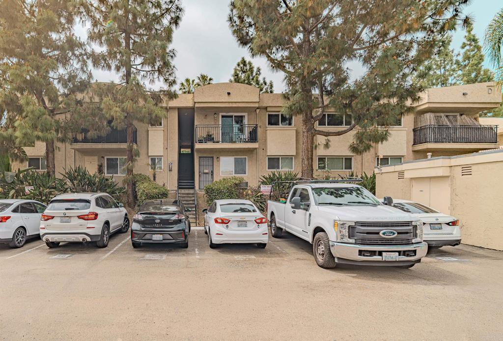 9860 Dale Avenue, Unit D10 Spring Valley, CA 91977 - Photo 3 of 55 a view of a cars parked in front of a house