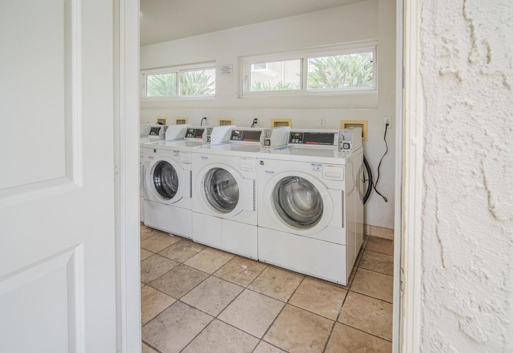 9860 Dale Avenue, Unit D10 Spring Valley, CA 91977 - Photo 35 of 55 a utility room with dryer and washer