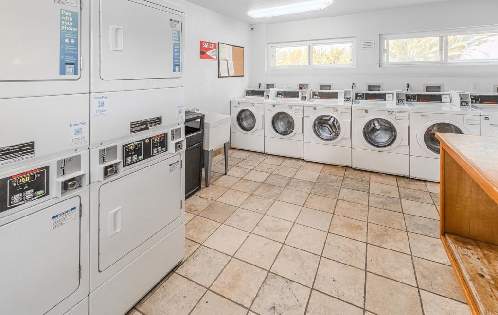 9860 Dale Avenue, Unit D10 Spring Valley, CA 91977 - Photo 37 of 55 a utility room with multiple dryer and washer