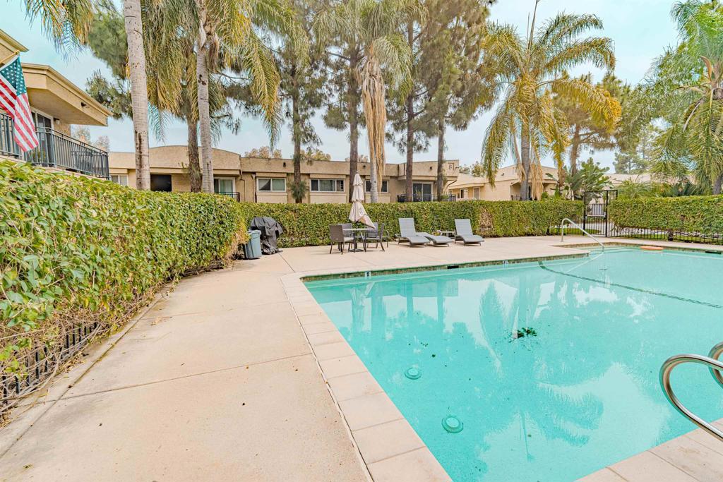 9860 Dale Avenue, Unit D10 Spring Valley, CA 91977 - Photo 46 of 55 a view of a swimming pool with a patio