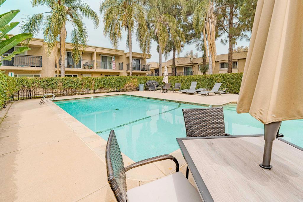 9860 Dale Avenue, Unit D10 Spring Valley, CA 91977 - Photo 49 of 55 a view of a swimming pool with seating space