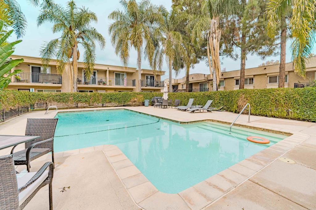 9860 Dale Avenue, Unit D10 Spring Valley, CA 91977 - Photo 50 of 55 a house with swimming pool in front of it