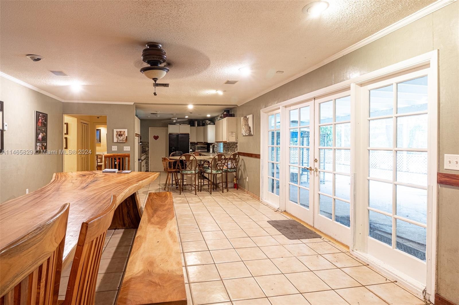 6000 Southwest 118th Avenue Miami, FL 33183 - Photo 16 of 49 a living room with stainless steel appliances granite countertop furniture and a large window