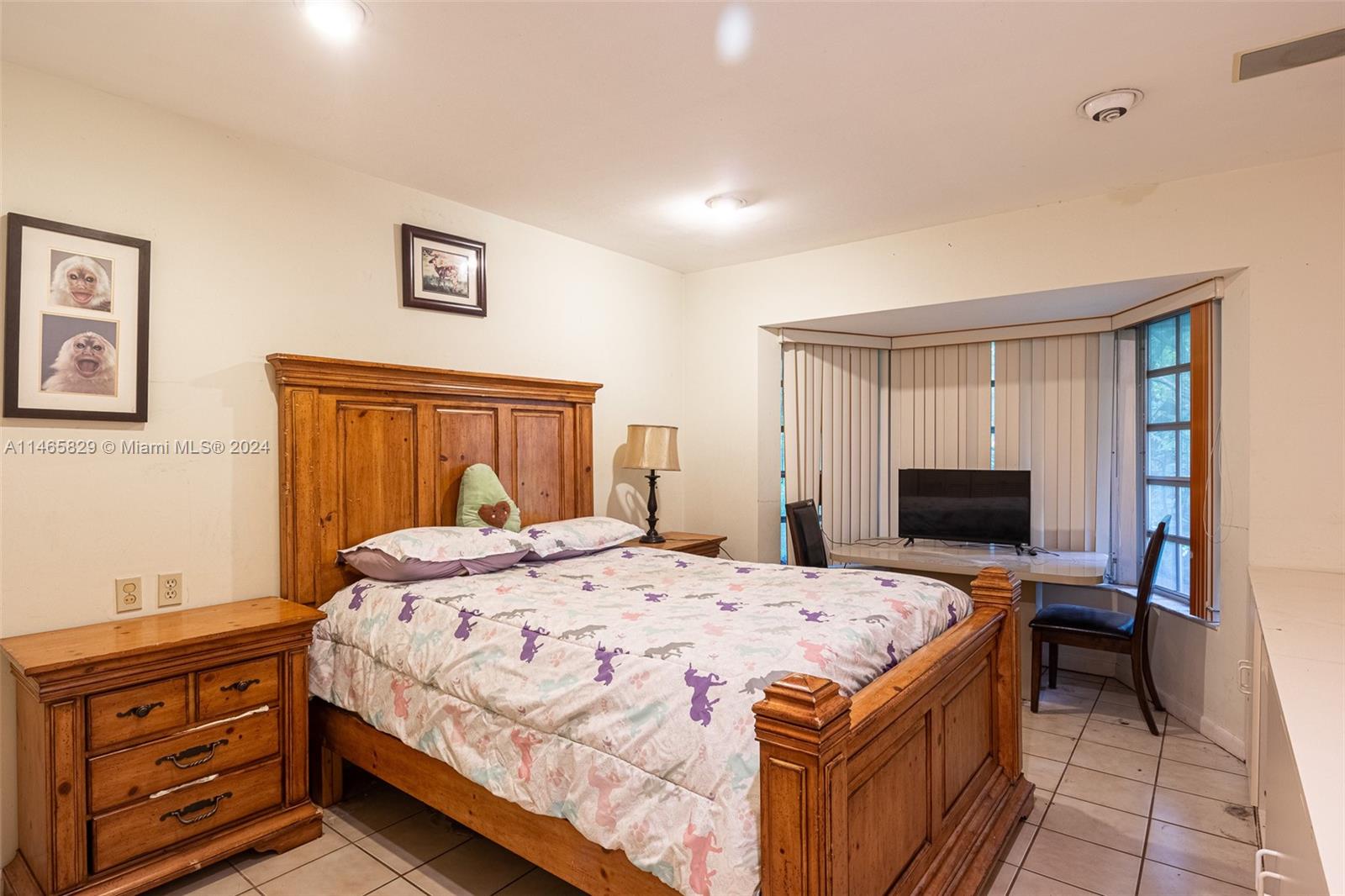 6000 Southwest 118th Avenue Miami, FL 33183 - Photo 20 of 49 a bedroom with a bed and furniture
