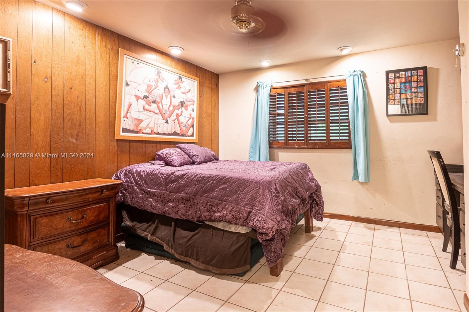 6000 Southwest 118th Avenue Miami, FL 33183 - Photo 23 of 49 a bedroom with a bed and a window