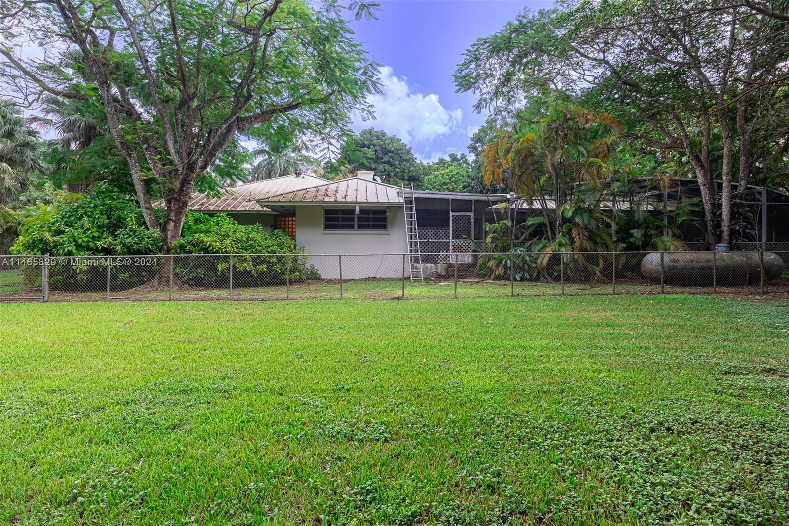 6000 Southwest 118th Avenue Miami, FL 33183 - Photo 33 of 49 a view of a house with a yard and sitting area