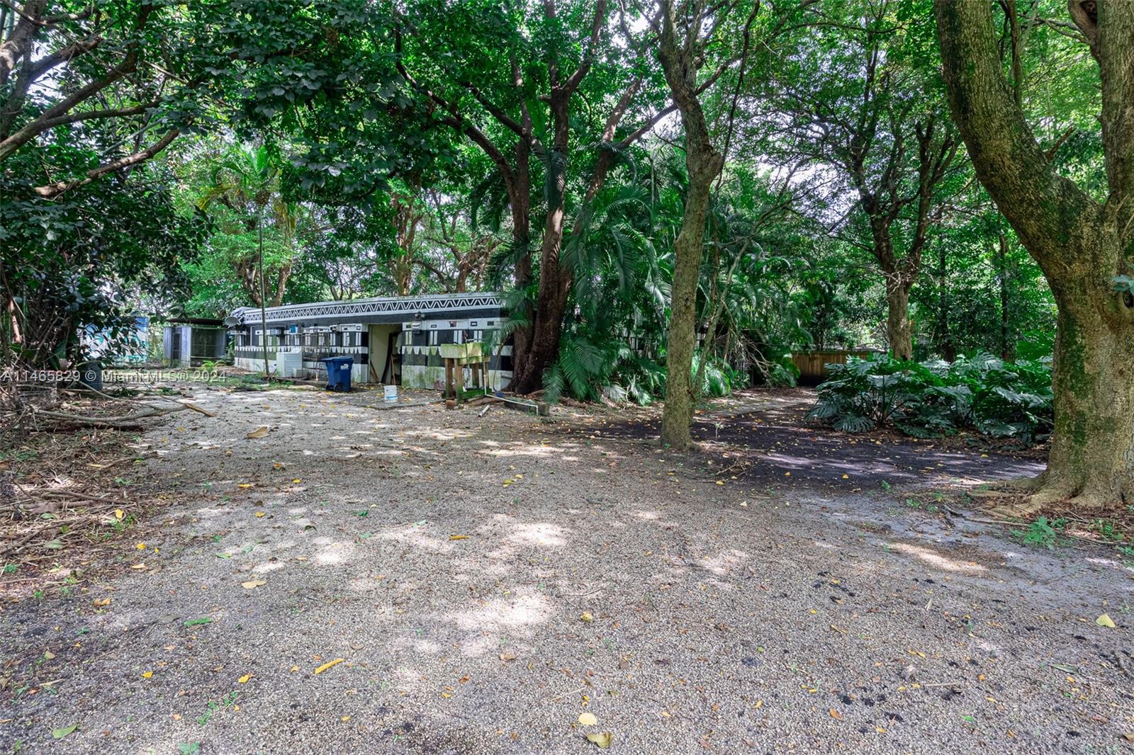 6000 Southwest 118th Avenue Miami, FL 33183 - Photo 46 of 49 a view of a house with a yard