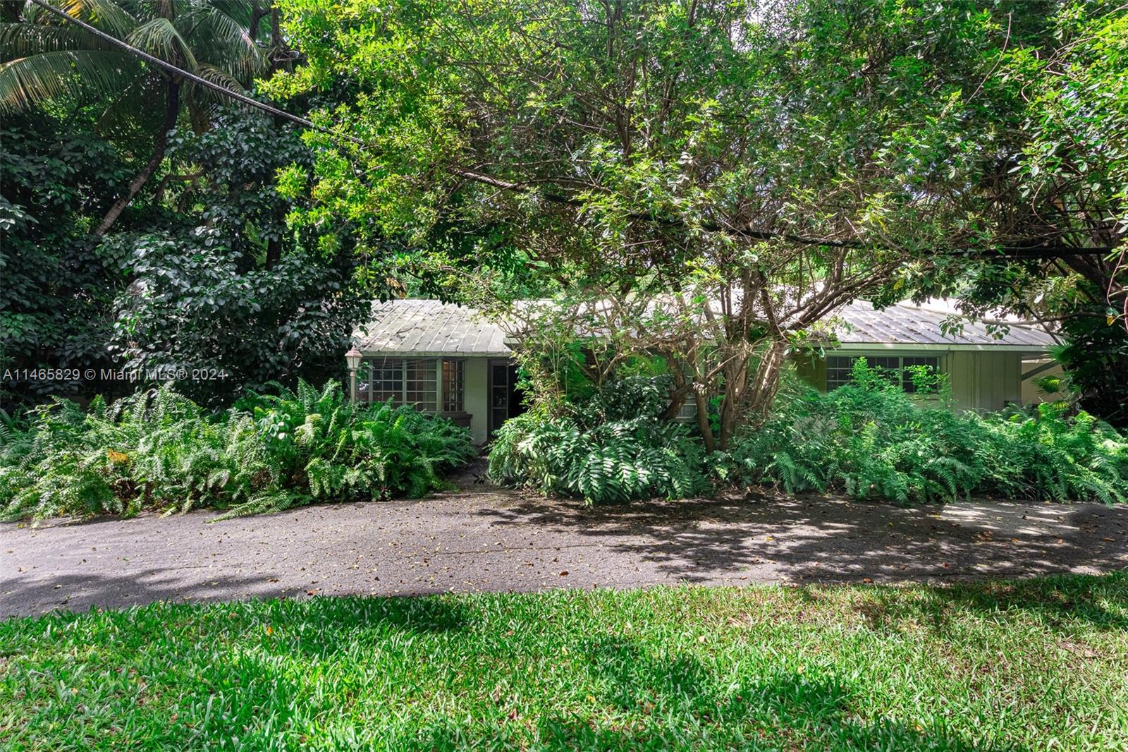 6000 Southwest 118th Avenue Miami, FL 33183 - Photo 6 of 49 a backyard of a house with lots of green space