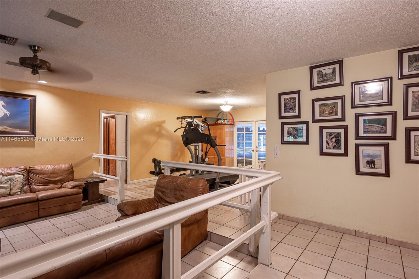 6000 Southwest 118th Avenue Miami, FL 33183 - Photo 10 of 49 a kitchen that has a lot of cabinets in it