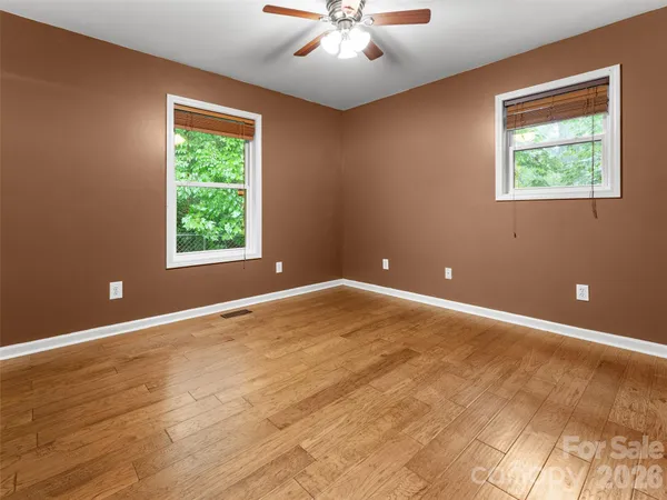 an empty room and window