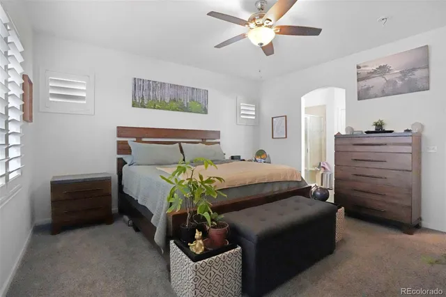 a bedroom with furniture and a bed