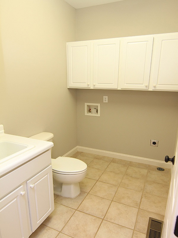 9677 Applewhite Road Wendell, NC 27591 - Photo 17 of 25 Laundry-1/2 bath
