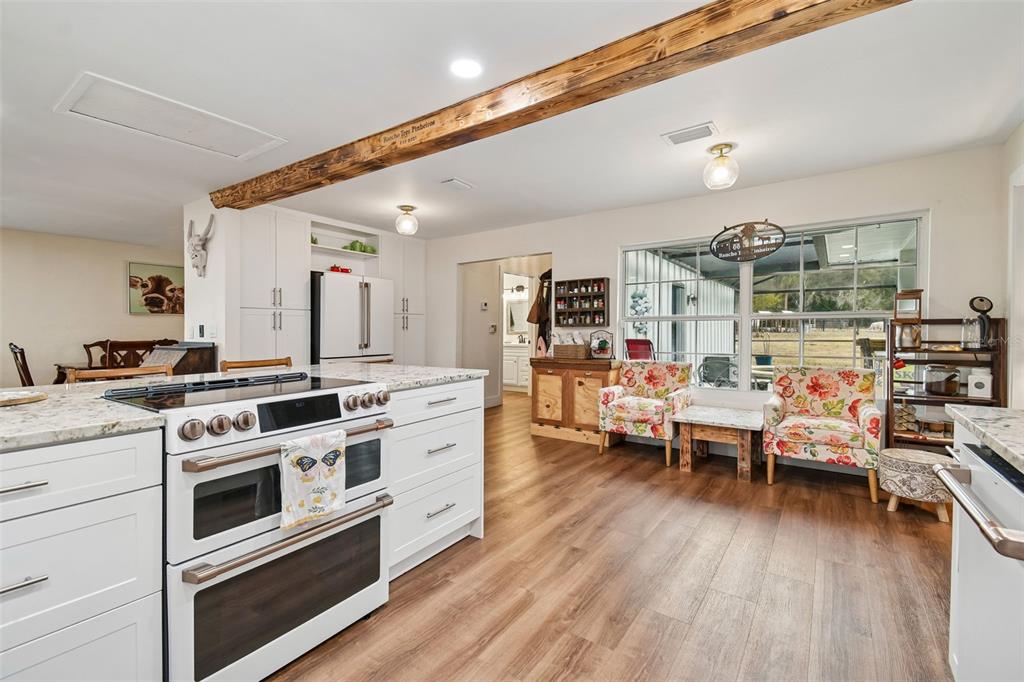 3009 Jim Johnson Road Plant City, FL 33566 - Photo 17 of 84 a large white kitchen with stainless steel appliances