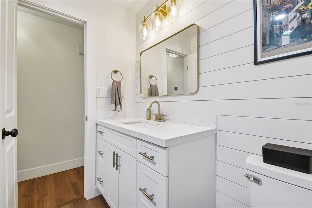 3009 Jim Johnson Road Plant City, FL 33566 - Photo 37 of 84 a bathroom with a sink and a mirror