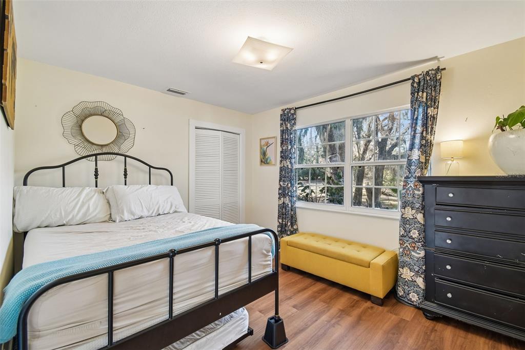 3009 Jim Johnson Road Plant City, FL 33566 - Photo 42 of 84 a bedroom with a bed next to a window with outer view