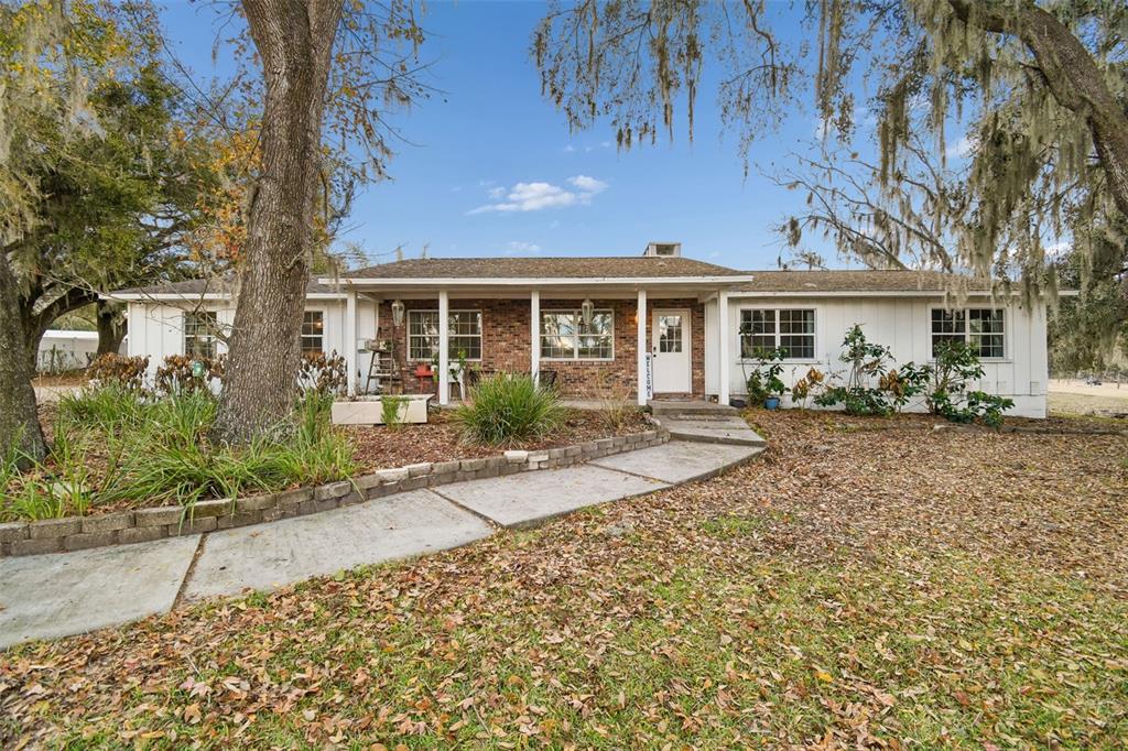 3009 Jim Johnson Road Plant City, FL 33566 - Photo 71 of 84 front view of house with a yard
