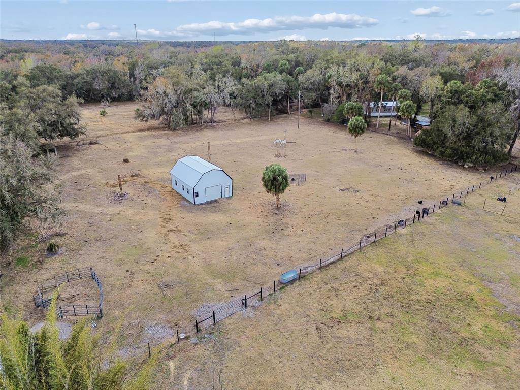 3009 Jim Johnson Road Plant City, FL 33566 - Photo 79 of 84 a view of a lake with a mountain in the background