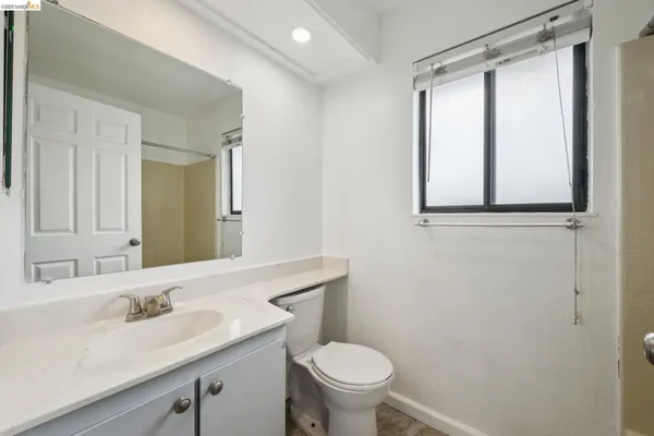 a bathroom with a sink and a toilet