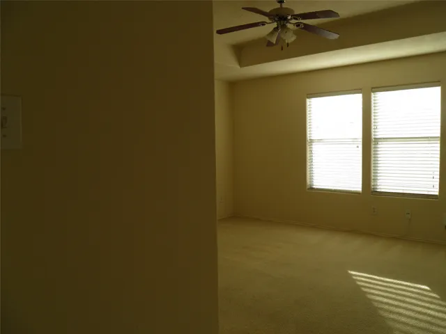 a bathroom with a tub and shower