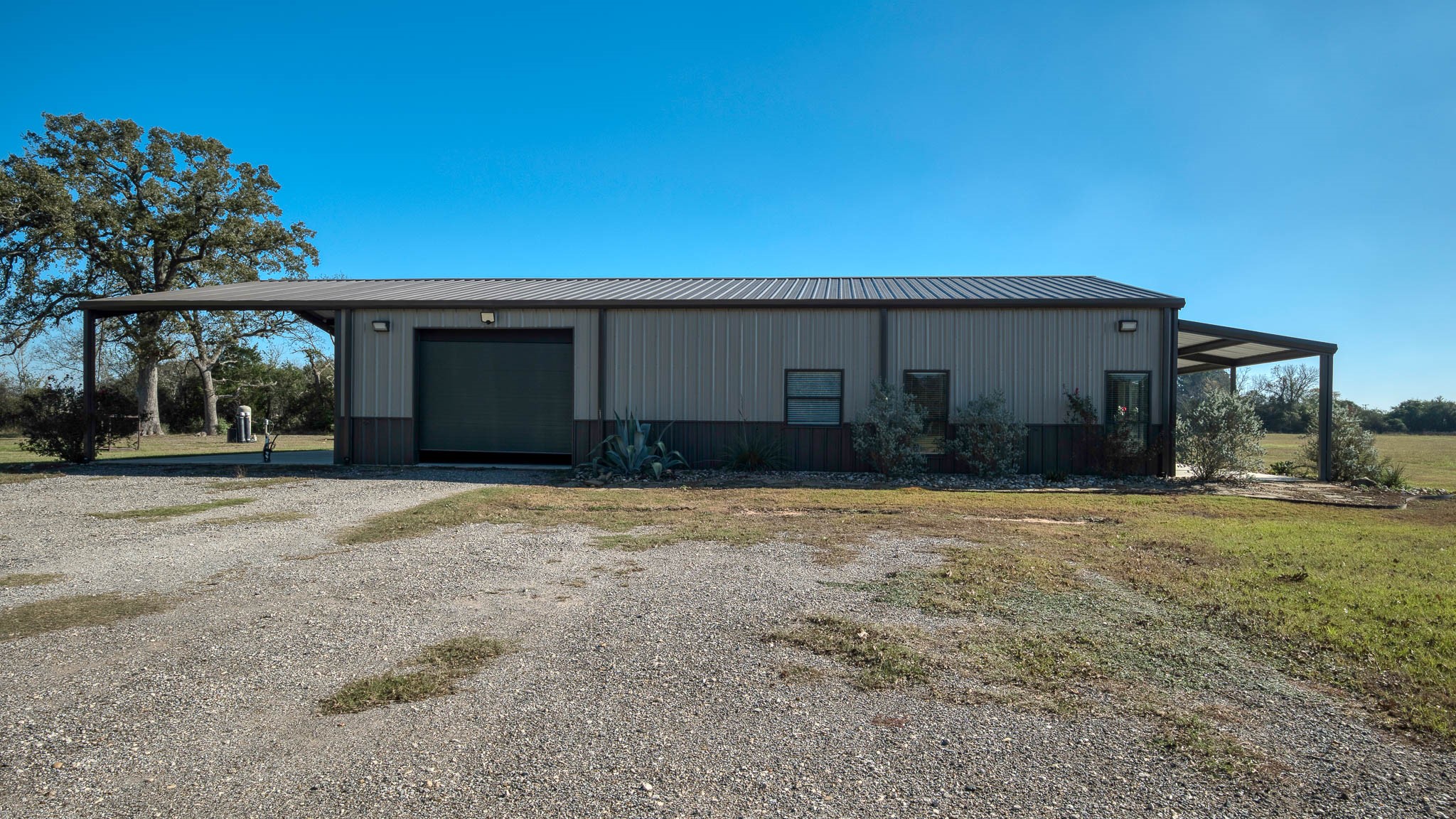 40934 Thomas Lane Hempstead, TX 77445 - Photo 32 of 50 Side & rear overhead doors to garage.