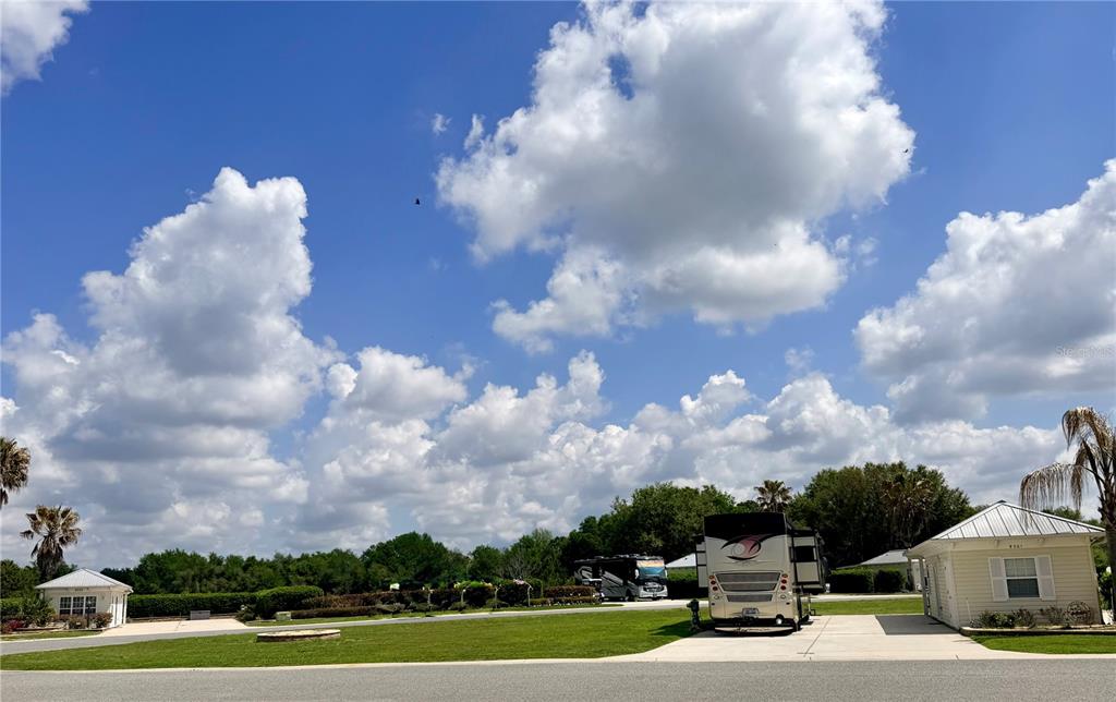 a view of a fountain in front of a house