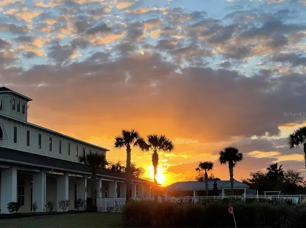 a view of house with outdoor space and street view