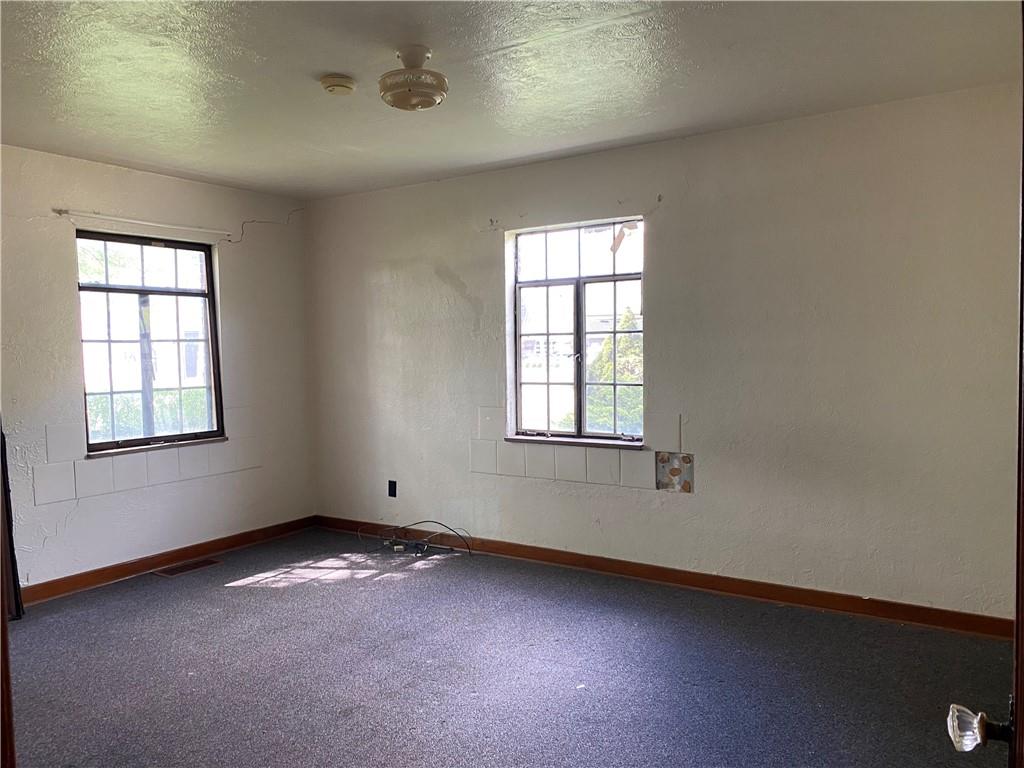 916 Russellton Road Cheswick, PA 15024 - Photo 3 of 10 an empty room with a window