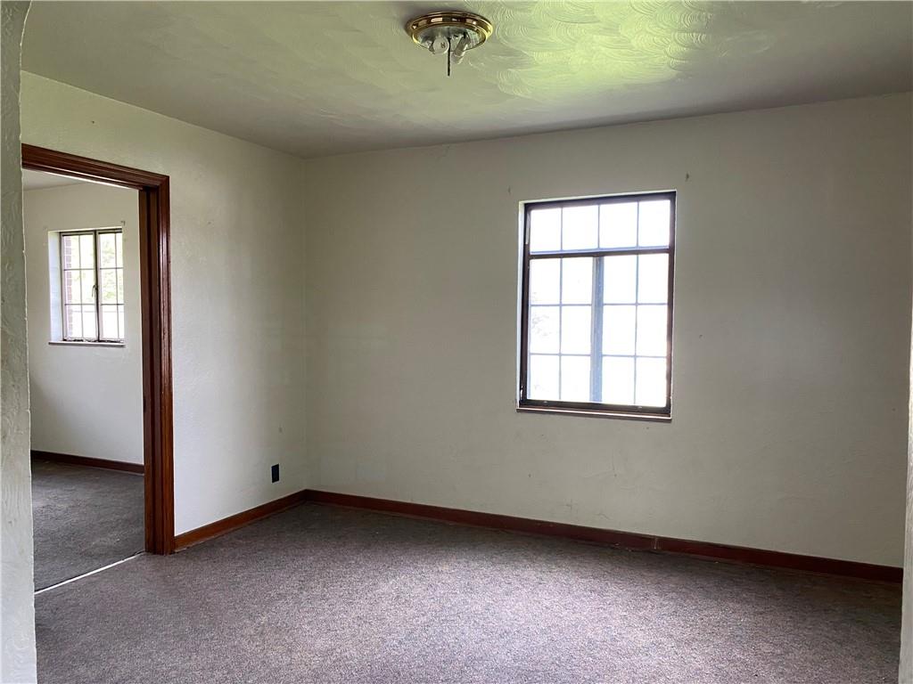 916 Russellton Road Cheswick, PA 15024 - Photo 4 of 10 an empty room with a window