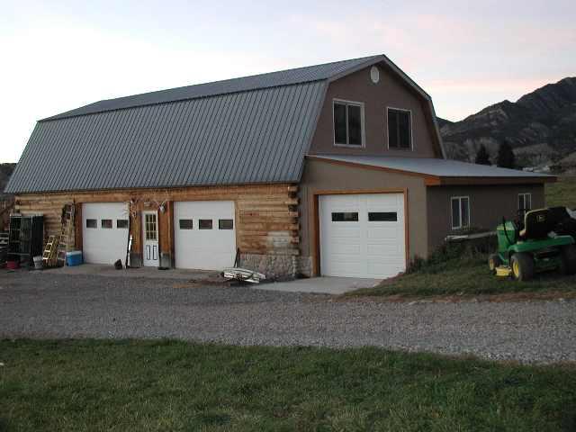 796 County Road, Unit 259 Rifle, CO 81650 - Photo 6 of 8 a front view of a house with a garden