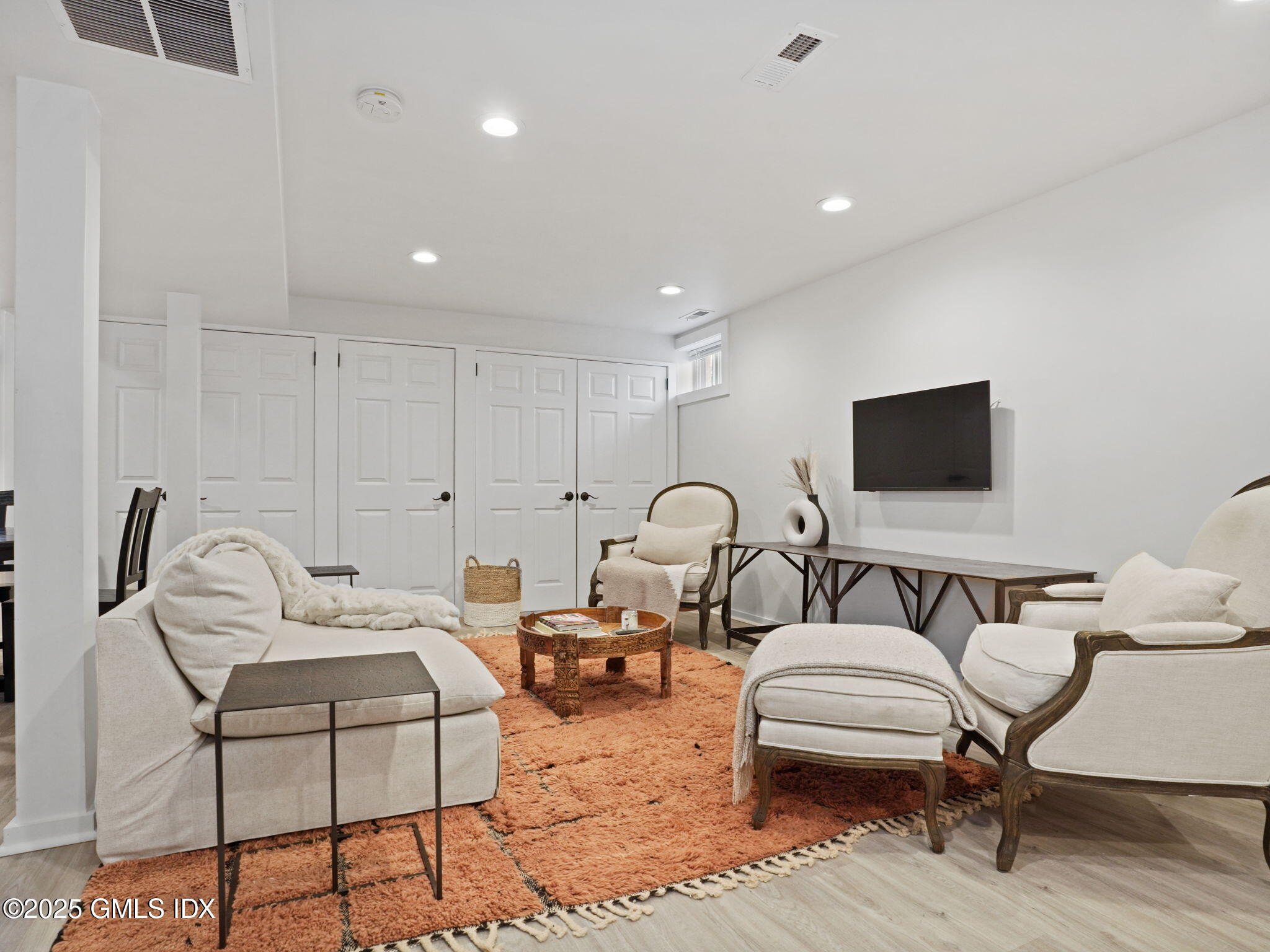 45 Gold Street Greenwich, CT 06830 - Photo 1 of 18 a living room with furniture and a flat screen tv