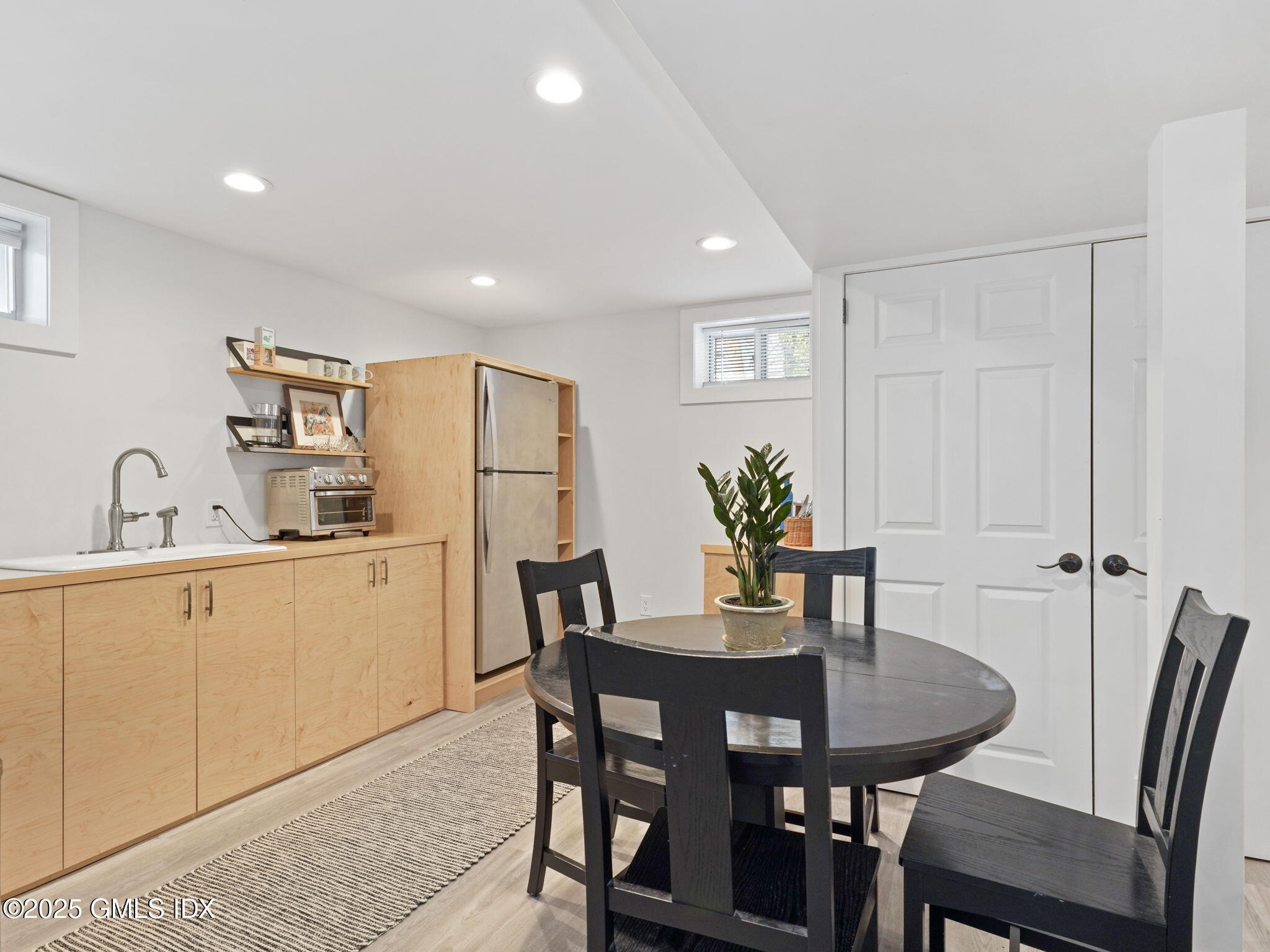 45 Gold Street Greenwich, CT 06830 - Photo 5 of 18 a view of a dining room with furniture and window