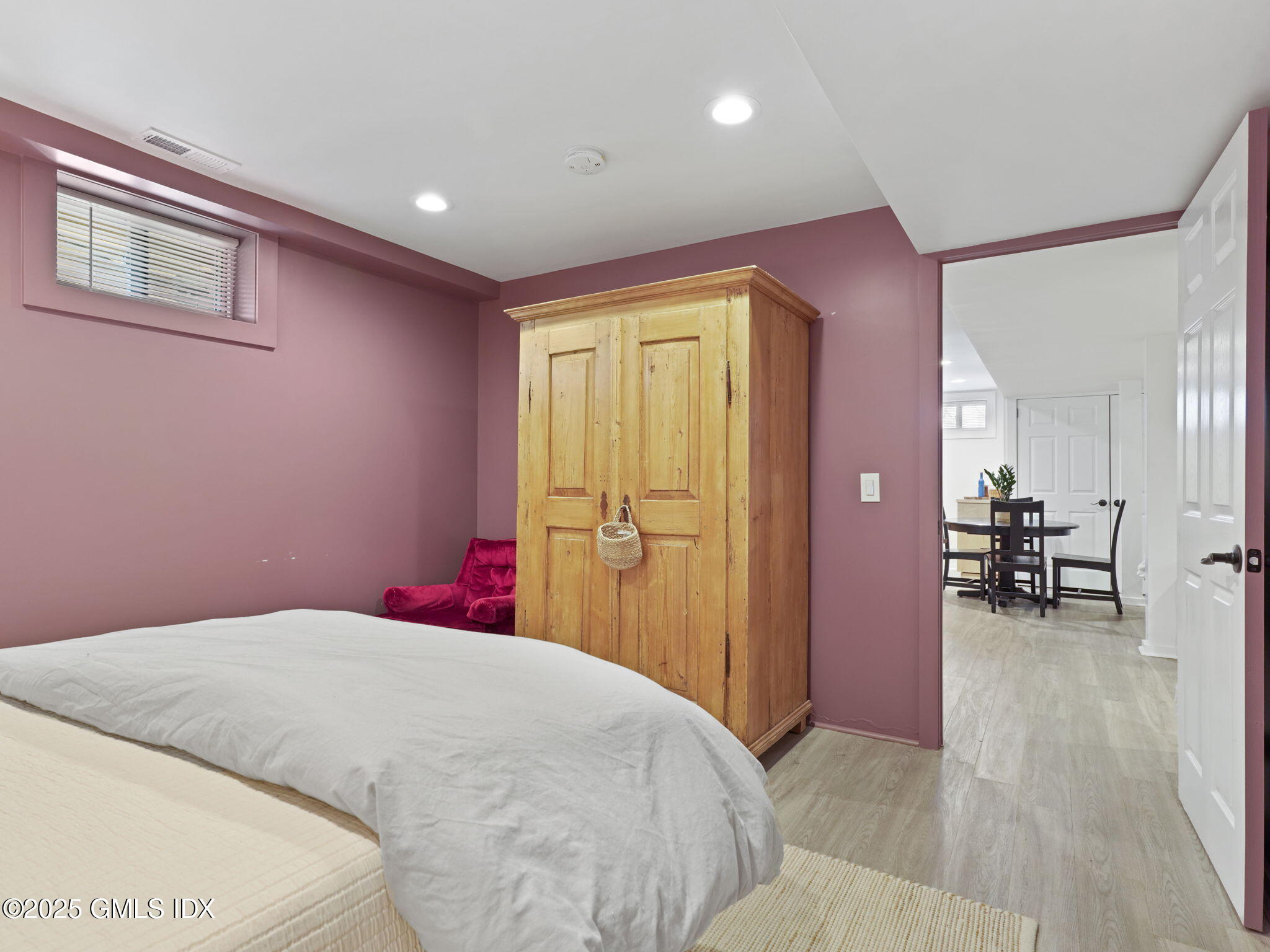 45 Gold Street Greenwich, CT 06830 - Photo 10 of 18 a bedroom with a bed and a table