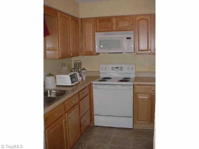 4727 Tower Road Greensboro, NC 27410 - Photo 3 of 7 Other. Kitchen in model