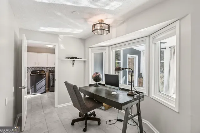 a view of a dining room with furniture
