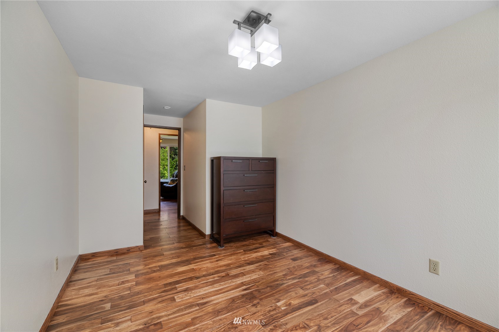 17515 24th Avenue Southeast Bothell, WA 98012 - Photo 21 of 39 a view of empty room with wooden floor