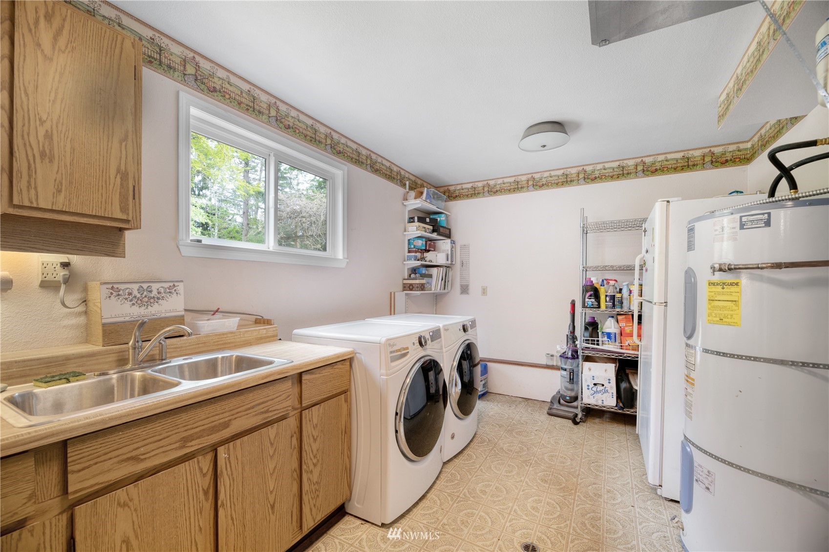 17515 24th Avenue Southeast Bothell, WA 98012 - Photo 27 of 39 a utility room with dryer and washer