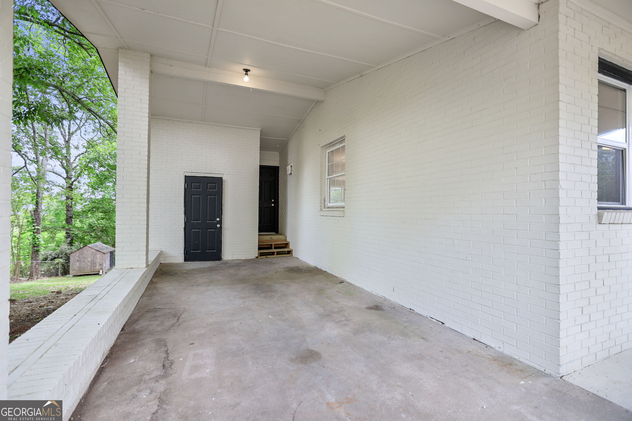 7060 Scenic Heights Road Manchester, GA 31816 - Photo 41 of 52 wooden floor in an empty room with a window